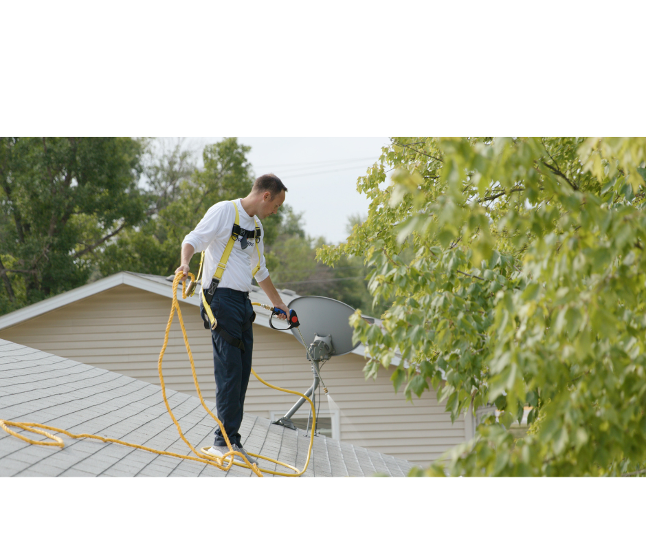 Roof technician inspecting shingles for insurance compliance